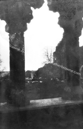 HOLYCROSS ABBEY THROUGH THE (RESTORED) ARCHES OF N. SIDE OF CLOISTER LOOKING S.W.